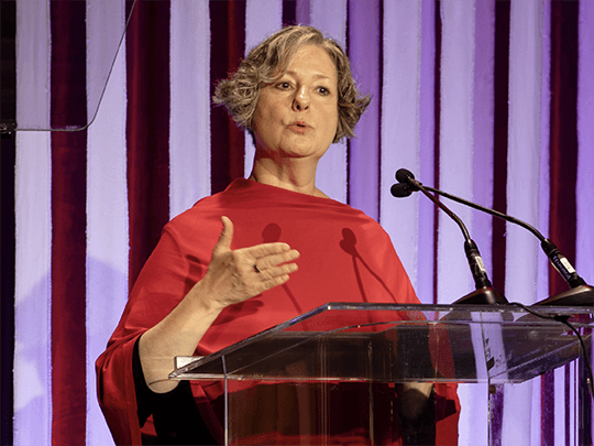 HIV/AIDS Bureau Associate Administrator Heather Hauck speaks at a podium during the 2026 National Ryan White Conference.