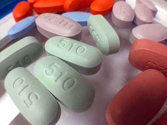 A pile of multi-color pills to fight HIV.