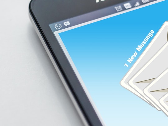 phone with email alert on screen